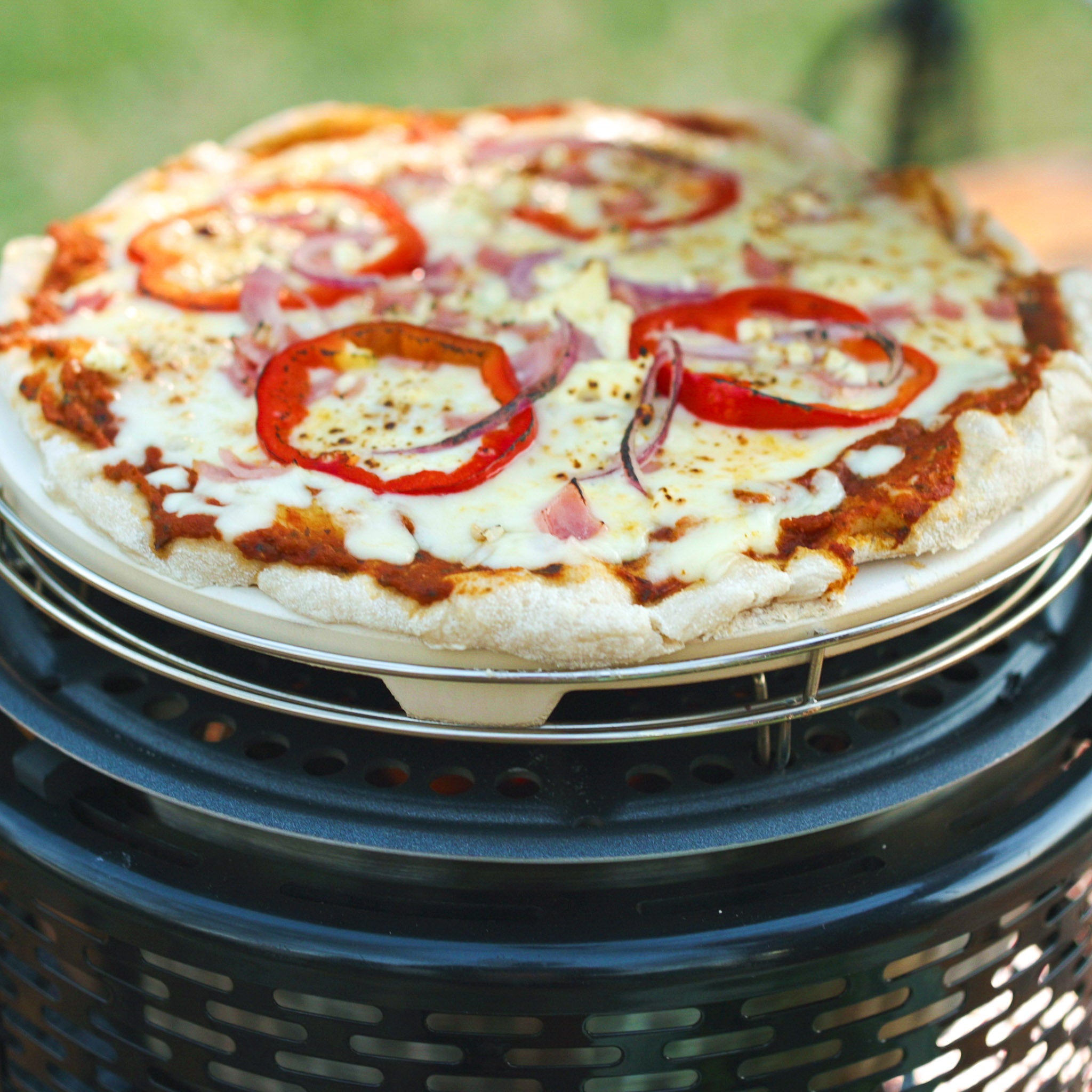 Cook pizza on the cobb grill with pizza stone