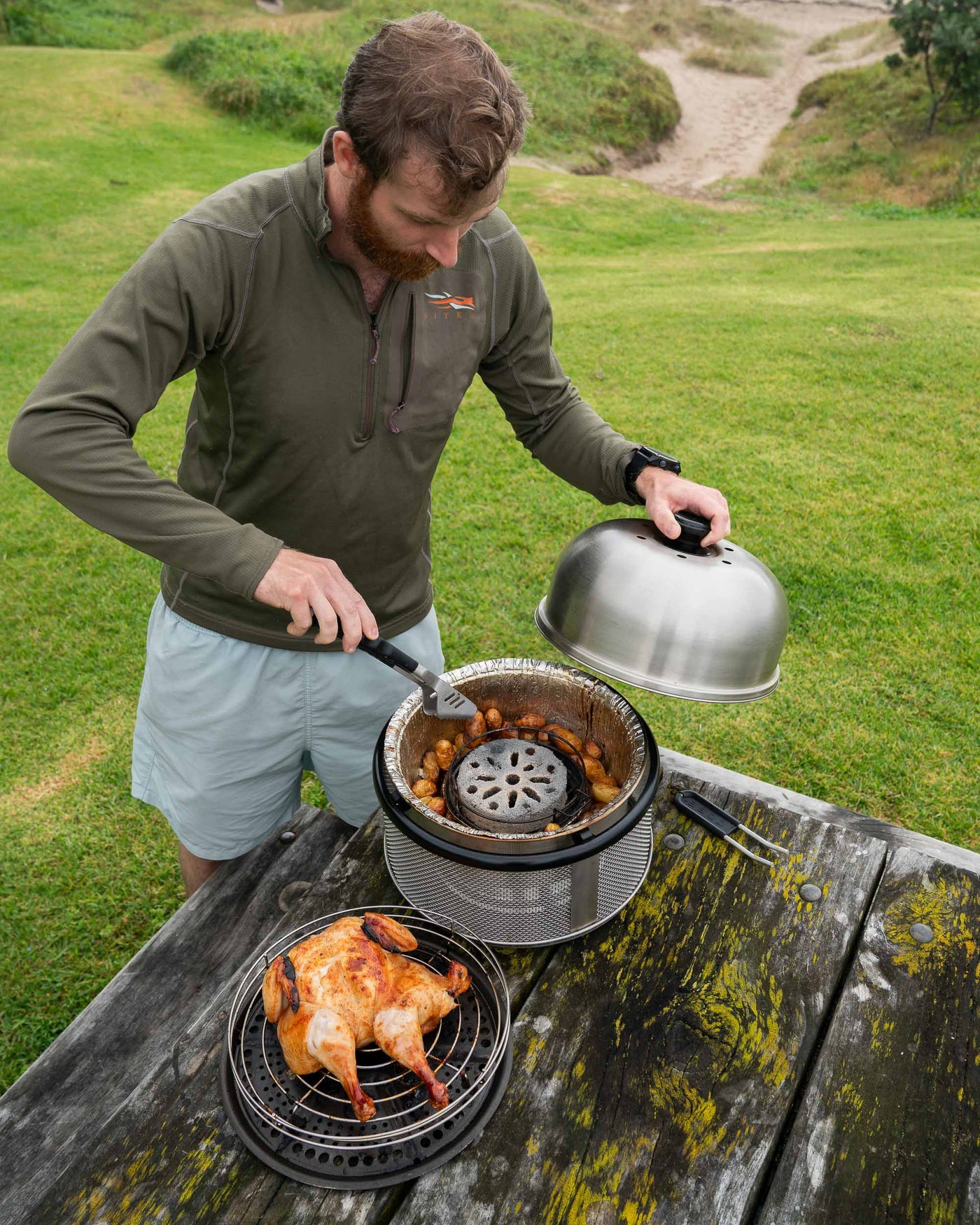 Roast chicken on the COBB Grill portable BBQ new zealand